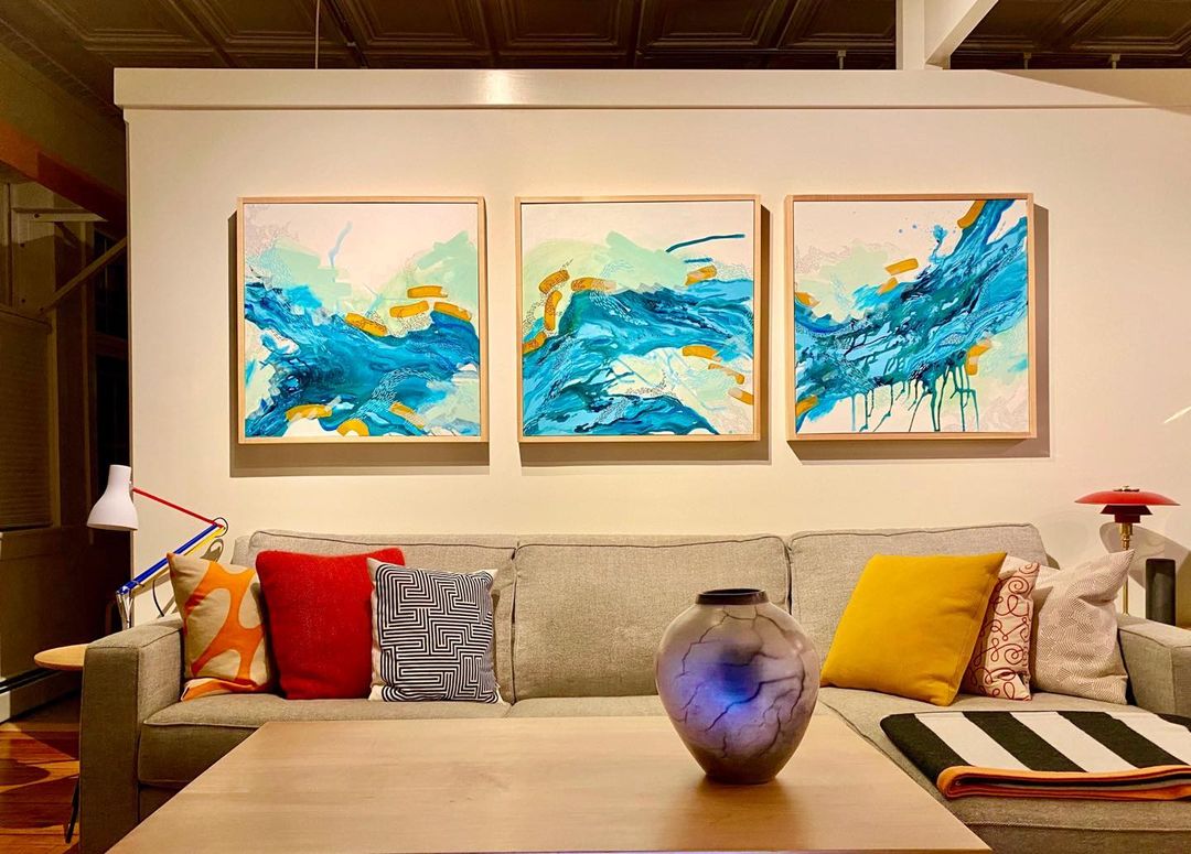 Jess Beer’s paintings on our living room wall. We have them here in our studio, having just photographed them for her. Beautiful work! #jessseer #orcuttphotography #carrabassettricerpaintings #maineart #maineartist