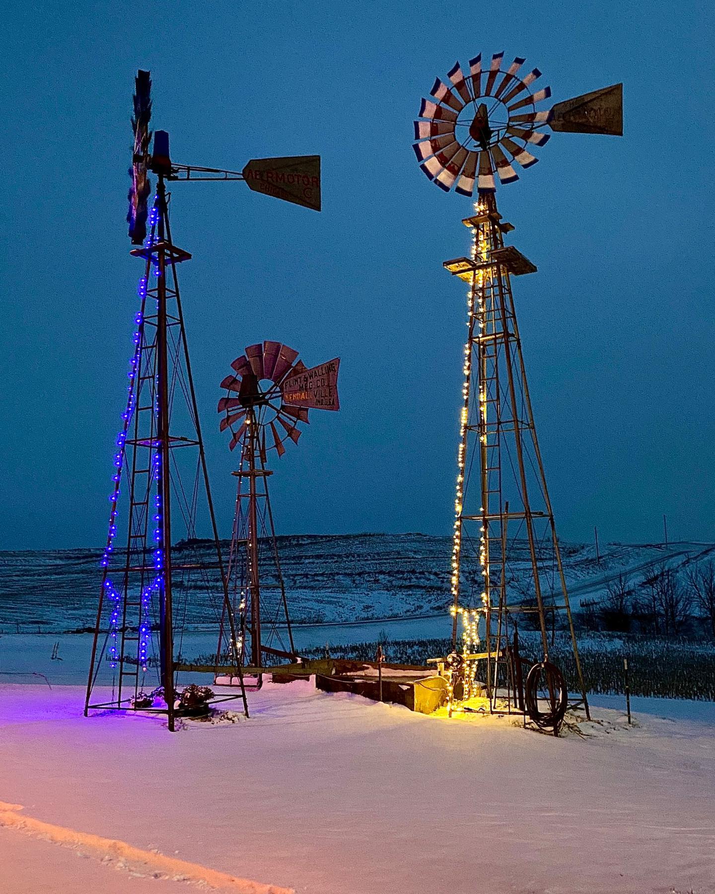 The windmills at Windmill Acres, lit for the holidays. This place offers free parking to RV’s as a member of Harvest Hosts. The proprietor, Mike Gibbs, has restored four antique windmills and has three more in his shop in various stages of repair photo by Cindy Orcutt.. #windmillacres #mikegibbs #harvesthosts #orcuttphotography #vanlife