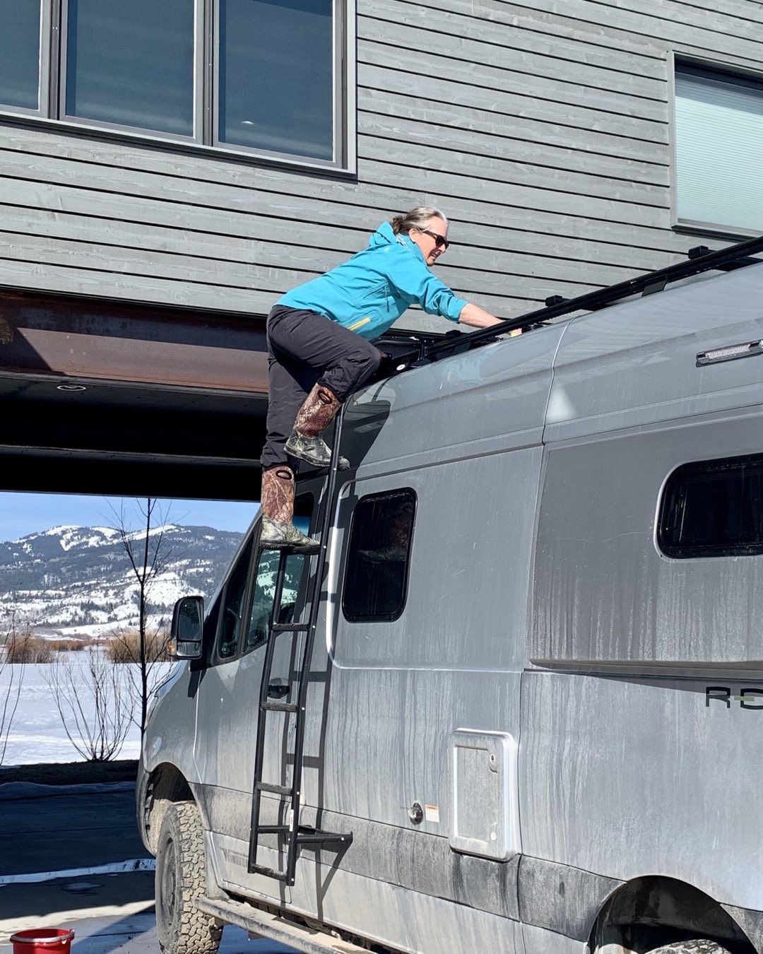 Cindy Orcutt cleaning off solar panels as we prepare for the trip back to Maine from eastern Idaho. We are leaving tomorrow morning after a grand stay of three and a half months in Teton Valley with side trips to extraordinary places here in the mountain west! Expect to be home by mid-April. #tetonvalleyidaho #vanlife #revelsprintervan #victoridaho #orcuttphitography.com #tripbacktomaine #opwagon #bestofthegemstate