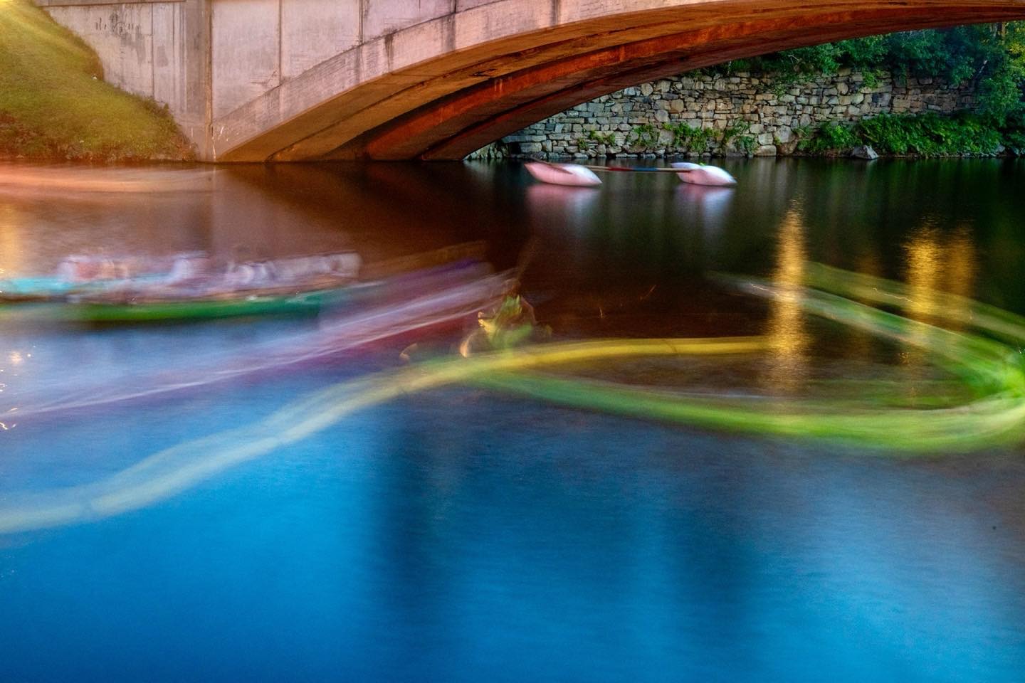 Boat swirls on the Mill Pond in Kingfield, Maine during the Fire on the Pond celebration this past weekend, a feature of Kingfield Days